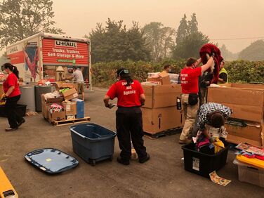 Central Aid Agency Emergency Response Personnel assist with donations management at the Roosevelt Donations Center during the 2020 Holiday Farm Fire Response.