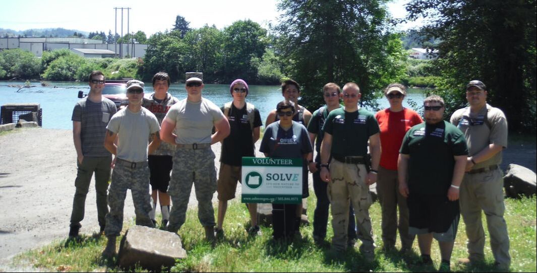 Central Aid Agency personnel, along with members of the Oregon Army National Guard and other volunteers teamed up to help clean garbage from the shores of the Willamette River in Eugene and Springfield.