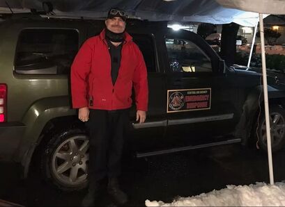 Emergency Response personnel deployed to deliver supplies to the unhoused during a severe winter storm.